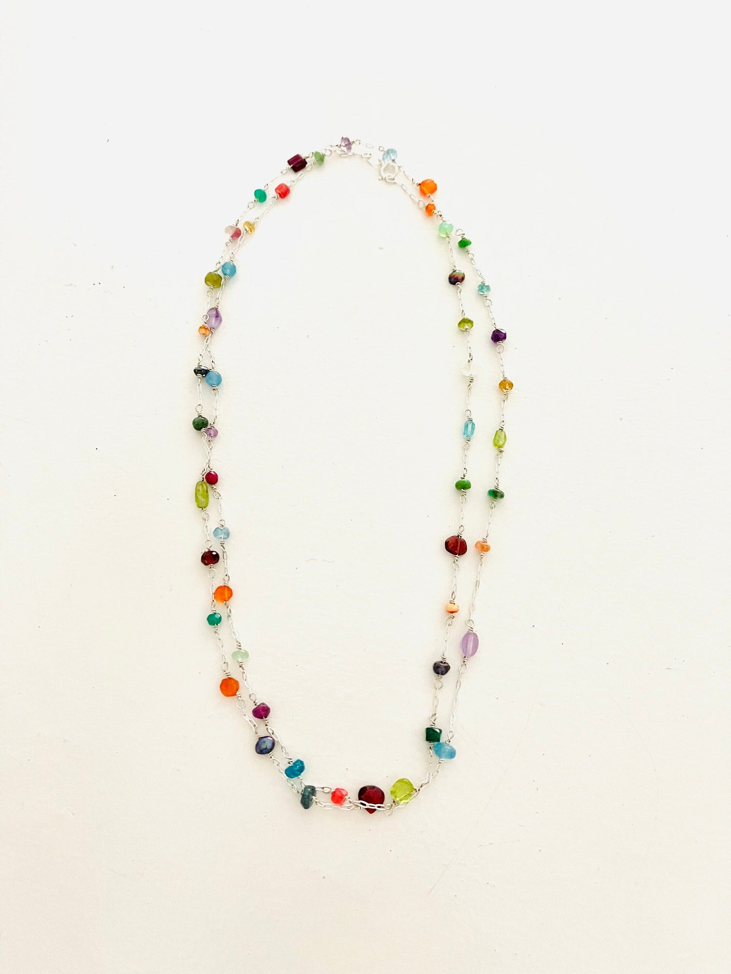 Long asymmetrical gemstone necklace