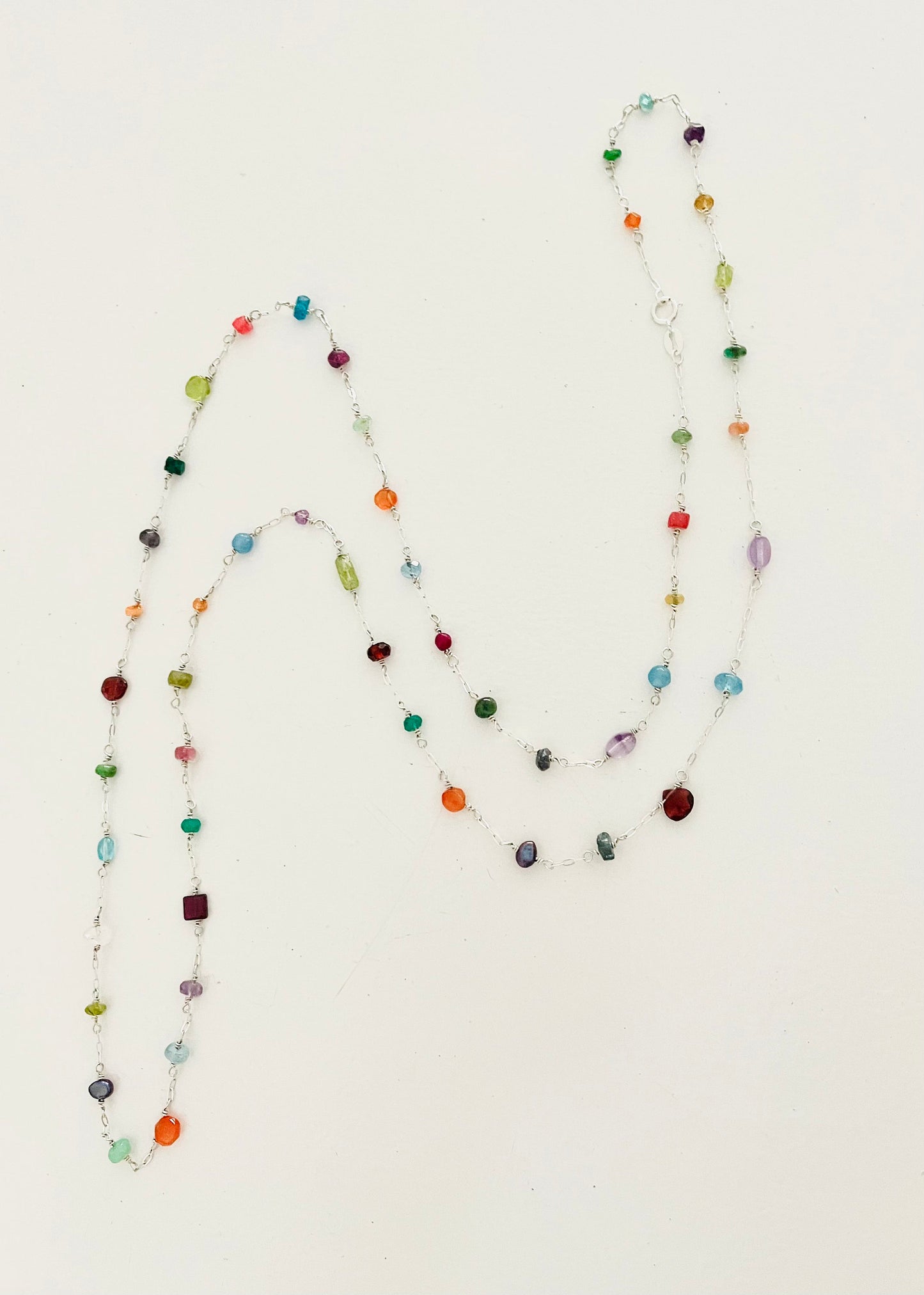 Long asymmetrical gemstone necklace